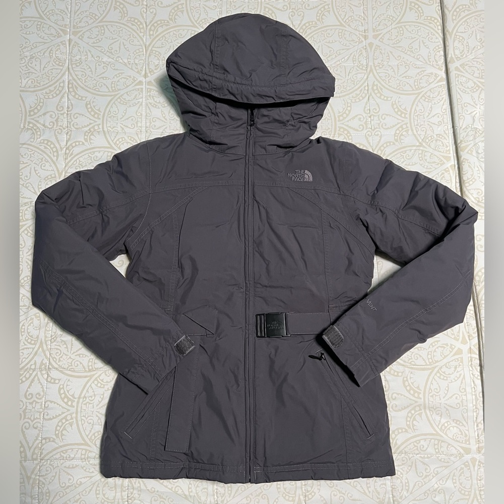 Gray North Face puffer jacket in size small.